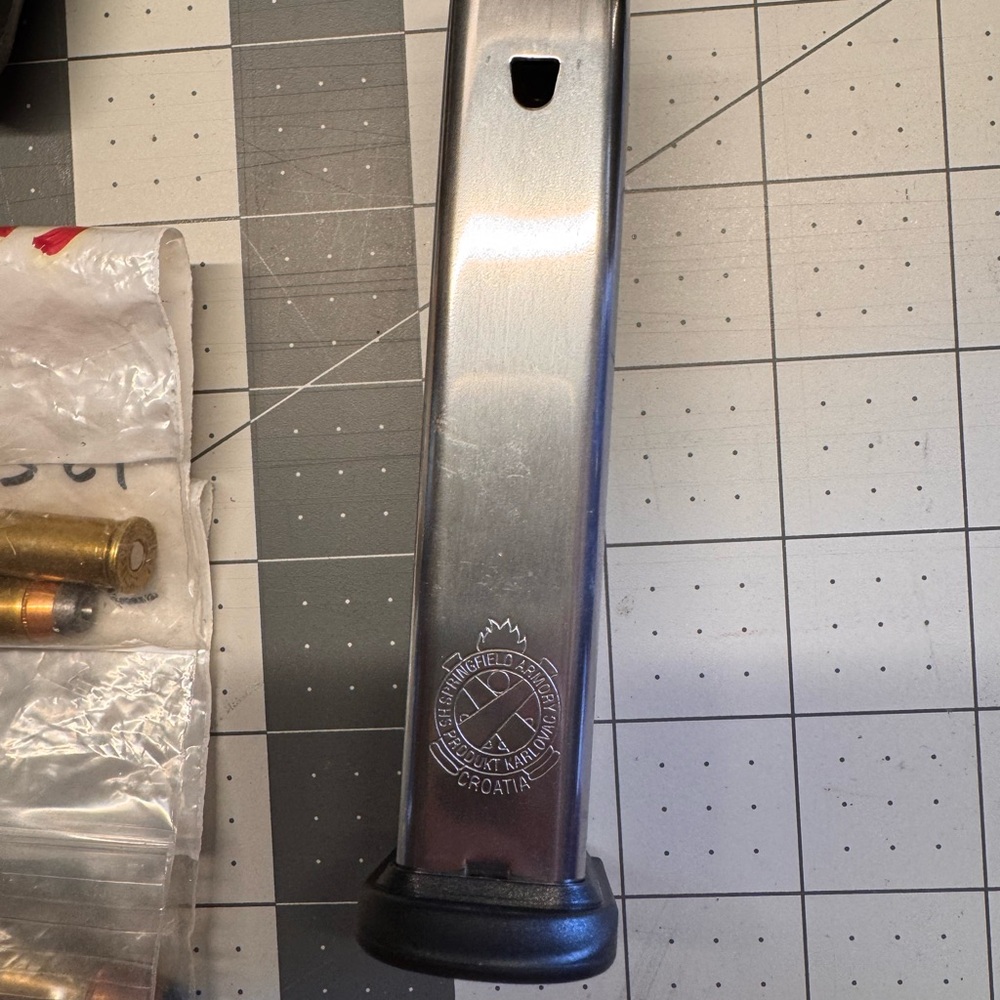 Springfield Armory XDM .40 S&W 16-round factory magazine.